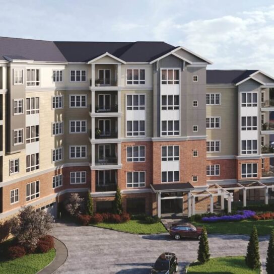 Modern apartment complex in Nashville, Tennesse with brick bottom and colorful siding. 